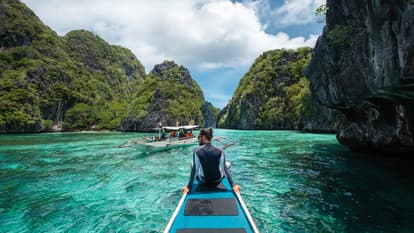 Take a dip in the lagoons in Coron